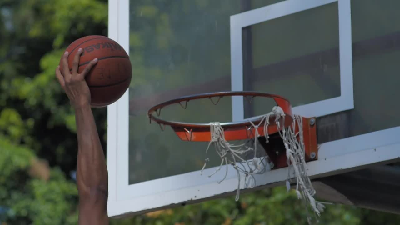 Basketball player making a dunk